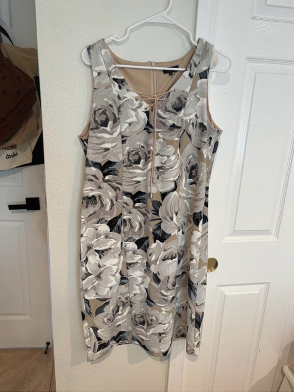 Sleeveless Beige Floral Shift Dress with Tie-Front Detail